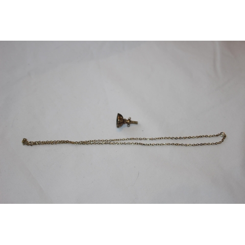 800 - 19TH CENTURY GILT METAL FOB WATCH KEY AND A YELLOW METAL CHAIN