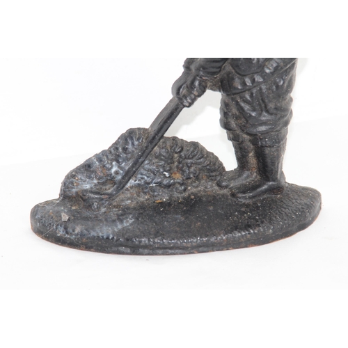 267 - VINTAGE GOLFING DOORSTOP
18CM