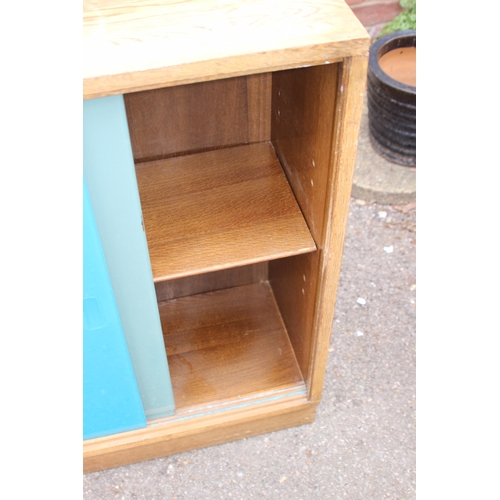 46 - 2 X RETRO PAINTED GLASS BOOKCASES 
137 X 29 X 78CM