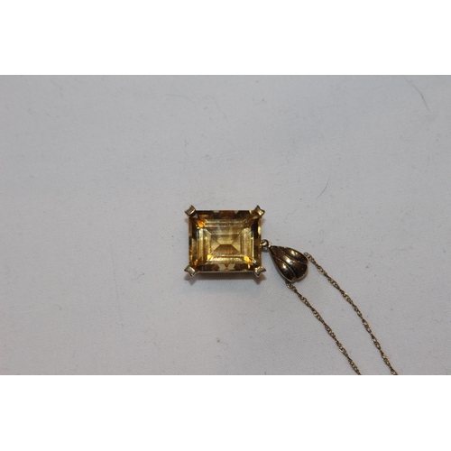 689 - SILVER GILT CUSHION CUT SINGLE YELLOW STONE PENDANT NECKLACE