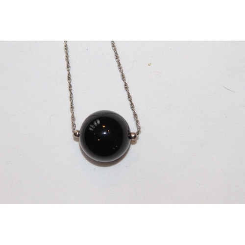 696 - UNUSUAL BLACK BALL FORM SILVER NECKLACE