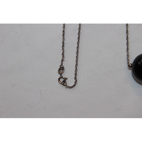 696 - UNUSUAL BLACK BALL FORM SILVER NECKLACE