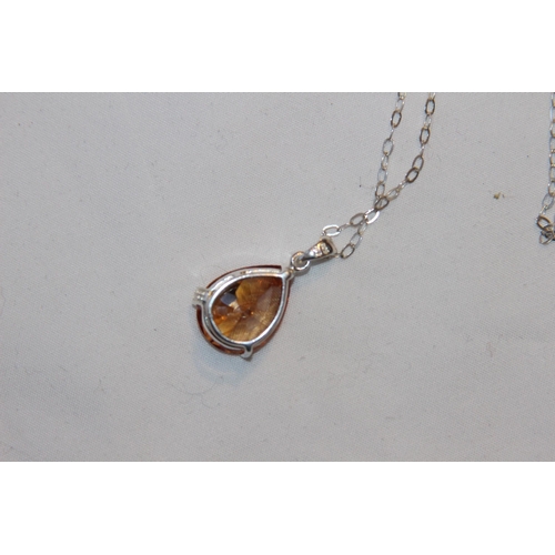 706 - SILVER PENDANT NECKLACE WITH ORANGE STONE AND CZ MOUNTED