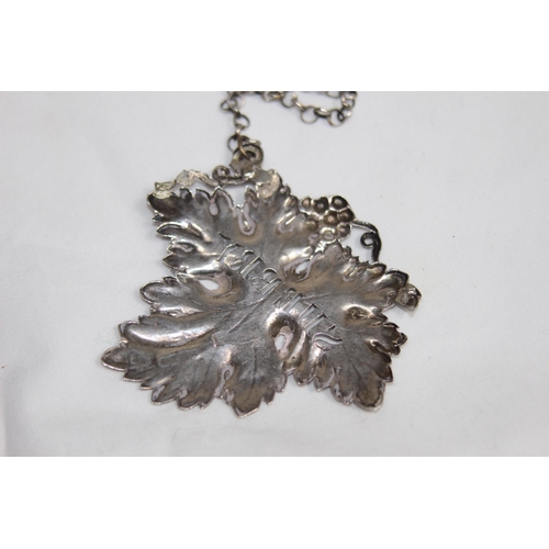 738 - LARGE GEORGIAN SILVER NATURALISTIC GRAPE LEAF FORM DECANTER LABEL - LONDON 1828