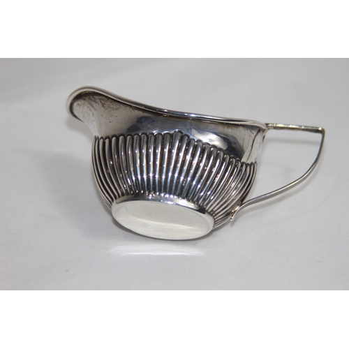 729 - SILVER DEMI REEDED CREAM JUG - BIRMINGHAM 1903