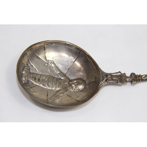 732 - GERMAN SILVER PRESENTATION SPOON POSSIBLY BAPTISMAL SPOON FEATURING IMAGE OF A BABY - 800 GRADE