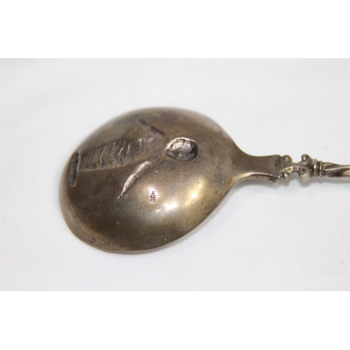 732 - GERMAN SILVER PRESENTATION SPOON POSSIBLY BAPTISMAL SPOON FEATURING IMAGE OF A BABY - 800 GRADE