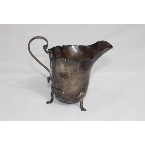 761 - HELMET FORM SILVER CREAM JUG - BIRMINGHAM 1931