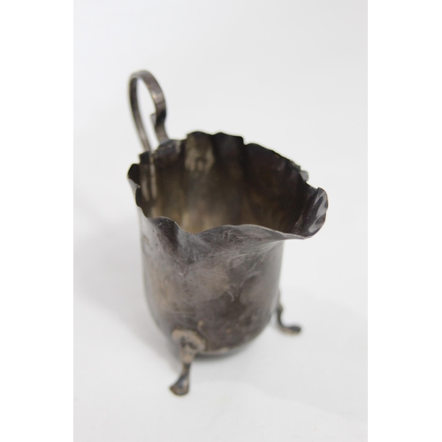 761 - HELMET FORM SILVER CREAM JUG - BIRMINGHAM 1931