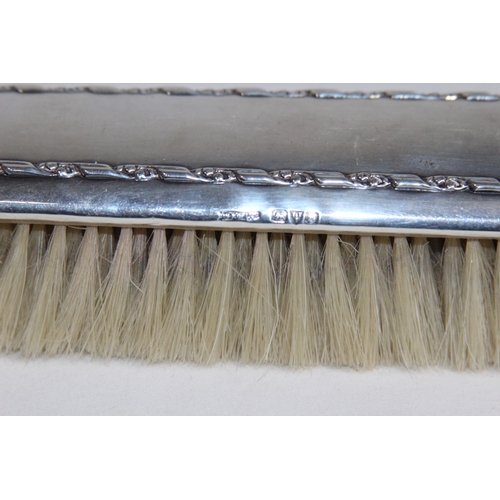 768 - SILVER BRUSH WITH ORNATE BOARDER - CHESTER 1909