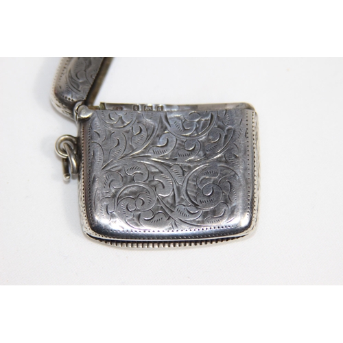 769 - EDWARDIAN LEFT HANDED CURVED BACK SILVER VESTA CASE - BIRMINGHAM 1903