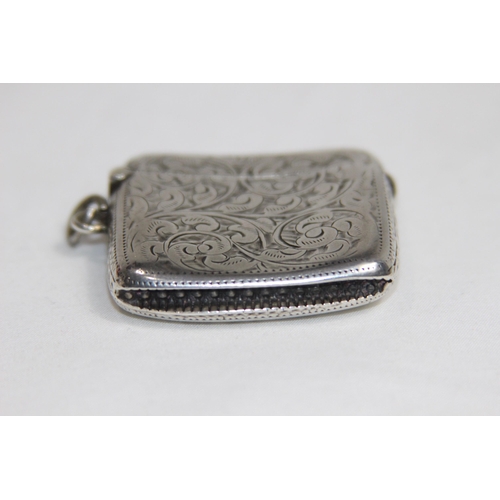 769 - EDWARDIAN LEFT HANDED CURVED BACK SILVER VESTA CASE - BIRMINGHAM 1903