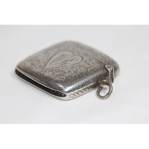 769 - EDWARDIAN LEFT HANDED CURVED BACK SILVER VESTA CASE - BIRMINGHAM 1903