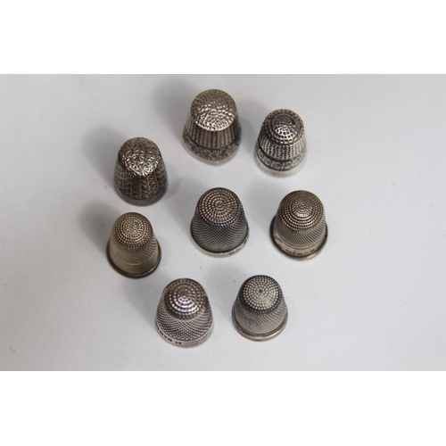 778 - SELECTION OF 8 SILVER THIMBLES INCLUDING CHARLES HORNER EXAMPLES - ALL VARIED IN DESIGN