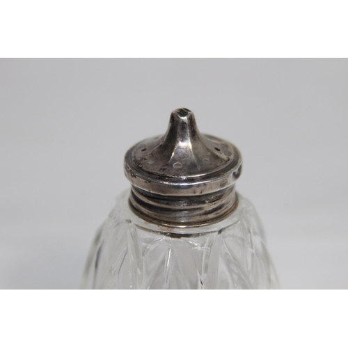 779 - SILVER TOPPED PEPPER POT AND SILVER RIMMED SALT