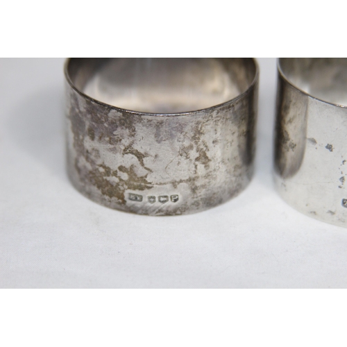 781 - TWO SILVER ROUND FORM NAPKIN RINGS - BIRMINGHAM 1924 AND SHEFFIELD 1932