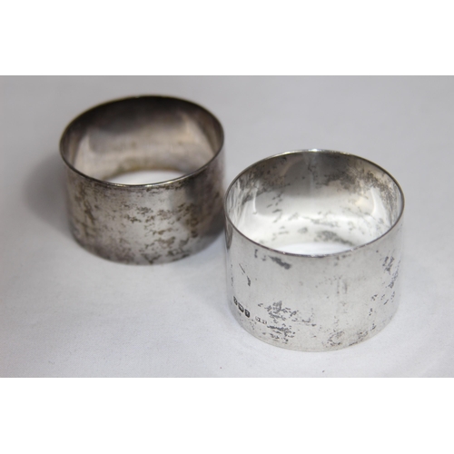 781 - TWO SILVER ROUND FORM NAPKIN RINGS - BIRMINGHAM 1924 AND SHEFFIELD 1932