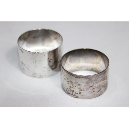 781 - TWO SILVER ROUND FORM NAPKIN RINGS - BIRMINGHAM 1924 AND SHEFFIELD 1932