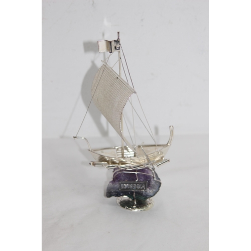 787 - WHITE ITALIAN METAL MODEL OF A BOAT SAT ON A GEODE AMETHYST BASE