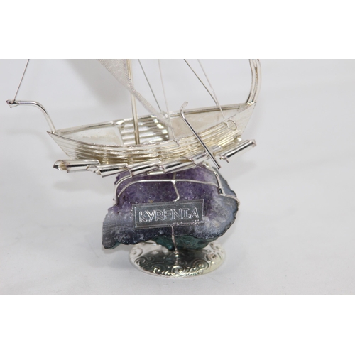 787 - WHITE ITALIAN METAL MODEL OF A BOAT SAT ON A GEODE AMETHYST BASE