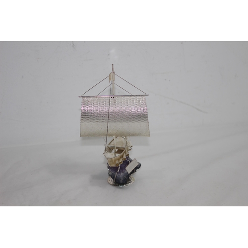 787 - WHITE ITALIAN METAL MODEL OF A BOAT SAT ON A GEODE AMETHYST BASE