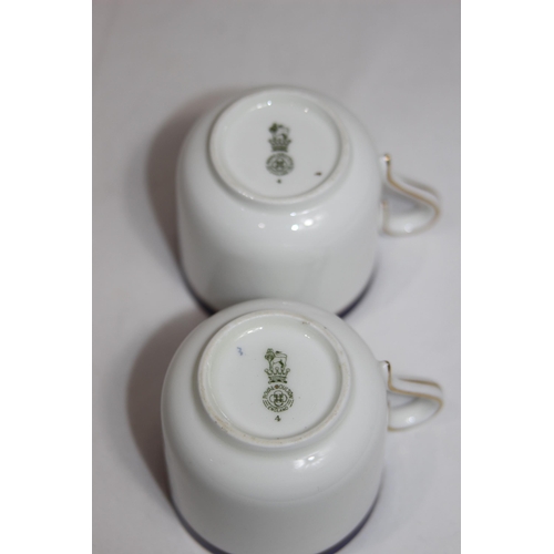 517 - PAIR OF WWII ROYAL DOULTON R.A.F CUP AND SAUCERS