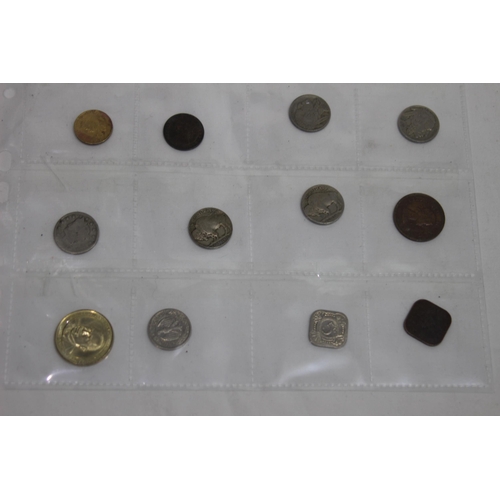 634 - SIX SLEEVES OF FOREIGN COINS AND TOKENS AND A QUANTITY OF LOOSE BRITISH AND FOREIGN COINS