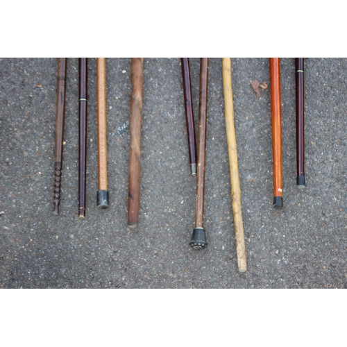 337 - QUANTITY OF WALKING STICKS ETC X9