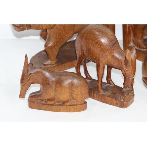 354 - QUANTITY OF ETHNIC CARVED ANIMALS INCLUDING BOOKENDS
20CM