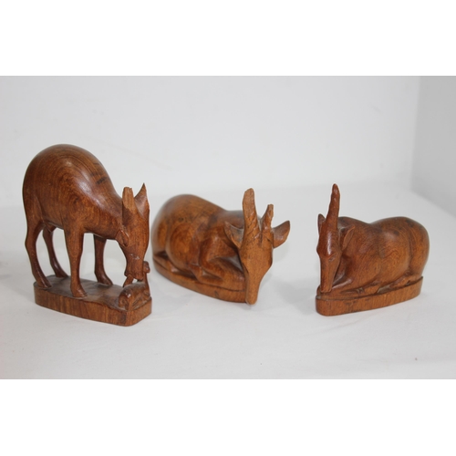 354 - QUANTITY OF ETHNIC CARVED ANIMALS INCLUDING BOOKENDS
20CM