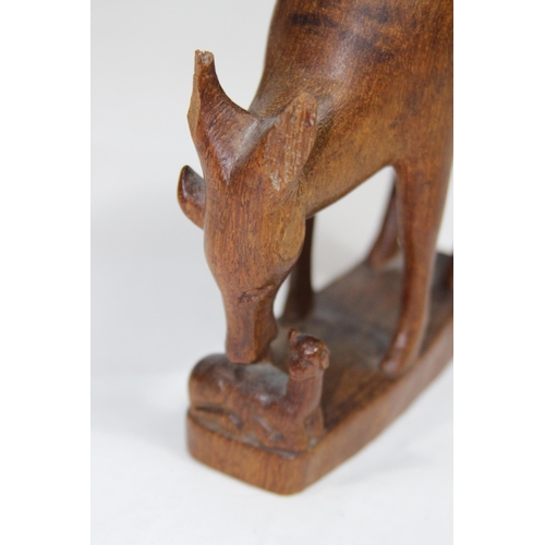 354 - QUANTITY OF ETHNIC CARVED ANIMALS INCLUDING BOOKENDS
20CM