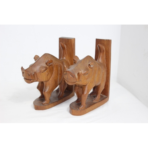 354 - QUANTITY OF ETHNIC CARVED ANIMALS INCLUDING BOOKENDS
20CM