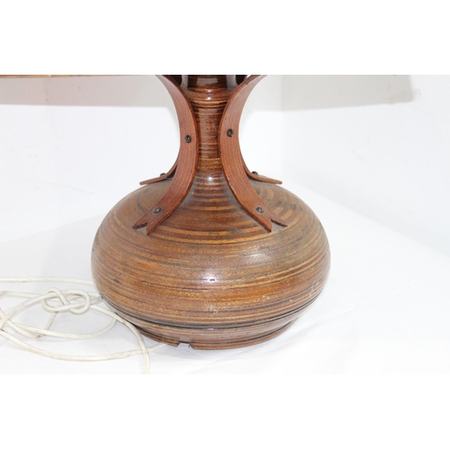 194 - LARGE WOODEN BASED AND FRAMED TABLE LAMP, SHADE MADE FROM 4 DIFFERENT COLOUR LEAD LINED PANELS WITH ... 