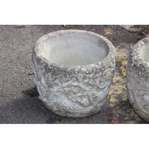 106 - PAIR OF STONE POTS
32 X 24CM