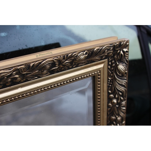 167 - LARGE ORNATE FRAMED MIRROR
127 X 100CM