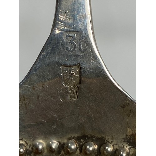 730 - DUTCH SILER WINE OR CADDY SPOON WITH WINDMILL DECORATION TO BOWL AND AN ARCHER ON THE STEM