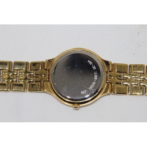 672 - BOXED ROTARY WATCH