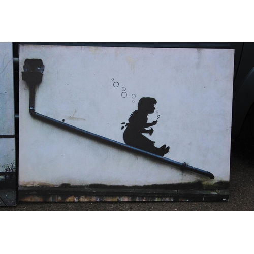 172 - 2 X BANKSY PRINTS ON CANVAS
91 X 66CM