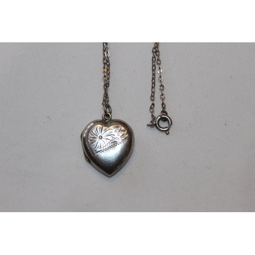 684 - SILVER HEART SHAPED LOCKET AND SILVER CHAIN TO HOLD TWO PHOTOS