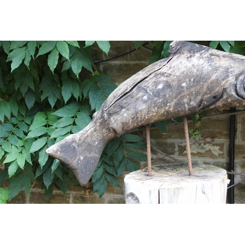 136 - CARVED WOODEN SALMON  ON STUMP
94 X 48CM