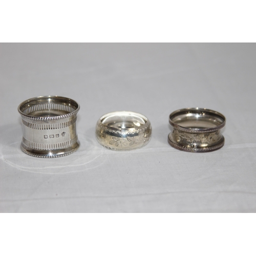 1086 - SELECTION OF 3 SILVER NAPKINS RINGS IN VARIED DESIGNS AND DATES - 33G