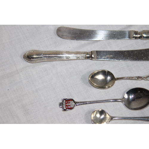 1094 - SELECTION OF SILVER SPOONS BOTH ENGLISH AND CONTINENTAL AND FOUR SILVER HANDLED KNIVES - VARIED MARK... 