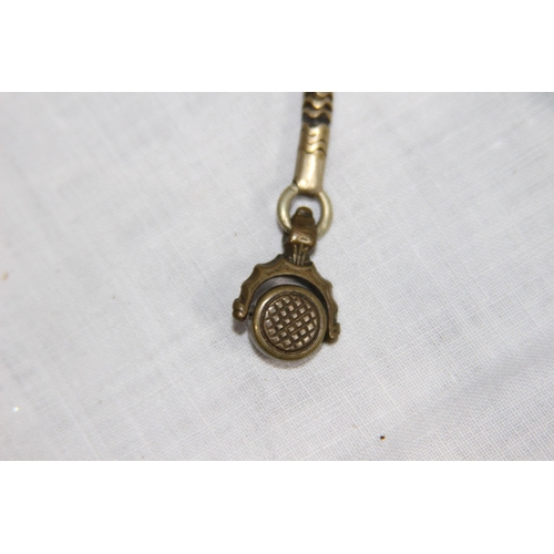 1097 - SWISS SILVER FOB WATCH ON A METAL CHAIN WITH SWIZZLE FOB