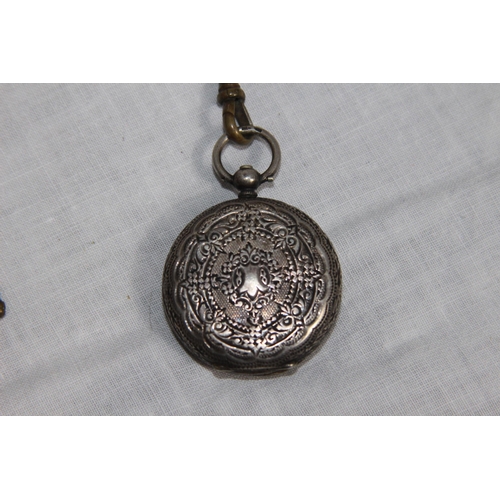 1097 - SWISS SILVER FOB WATCH ON A METAL CHAIN WITH SWIZZLE FOB