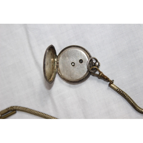 1097 - SWISS SILVER FOB WATCH ON A METAL CHAIN WITH SWIZZLE FOB