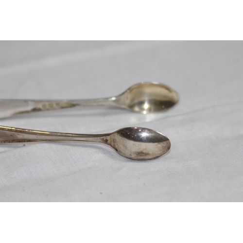 1101 - PAIR OF SILVER SUGAR TONGS BY A P CO - BIRMINGHAM 1962 - 18G