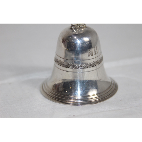 1109 - MEXICO OF SOUTH AMERICA WHITE METAL HANDBELL WITH FIGURAL HANDLE, MAKERS MARK TO THE CLANGER