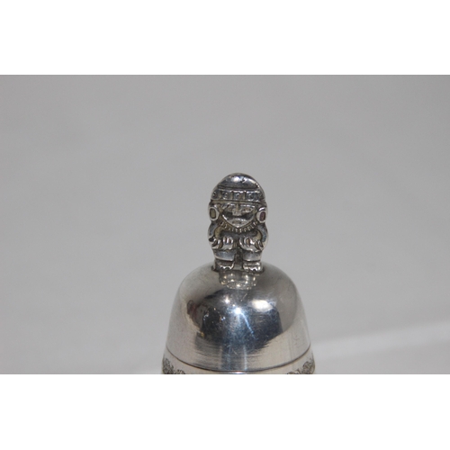 1109 - MEXICO OF SOUTH AMERICA WHITE METAL HANDBELL WITH FIGURAL HANDLE, MAKERS MARK TO THE CLANGER