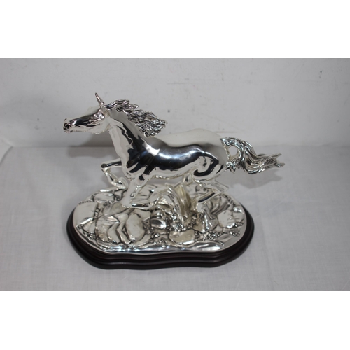 1111 - LARGE ITALIAN SILVER COVERED SCULPTURE OF A RUNNING HORSE ON A WOODEN PLINTH AND SIGNED MARCELLO GIO... 