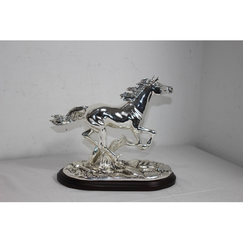 1111 - LARGE ITALIAN SILVER COVERED SCULPTURE OF A RUNNING HORSE ON A WOODEN PLINTH AND SIGNED MARCELLO GIO... 